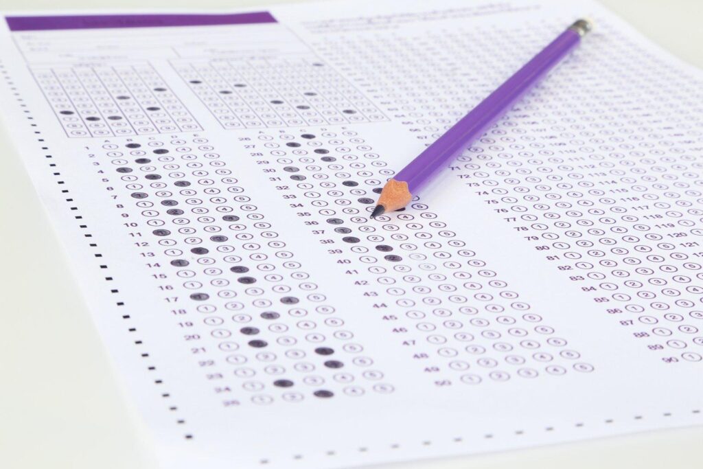 Clarity Psychology multiple choice assessment form with purple pencil resting on paper